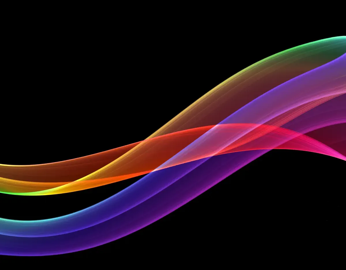 Colourful flowing abstract light waves on a black background
